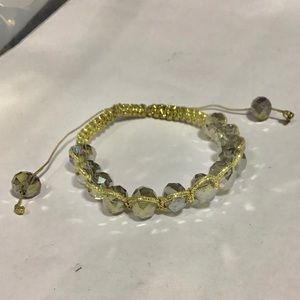 Cute bead and gold thread bracelet
